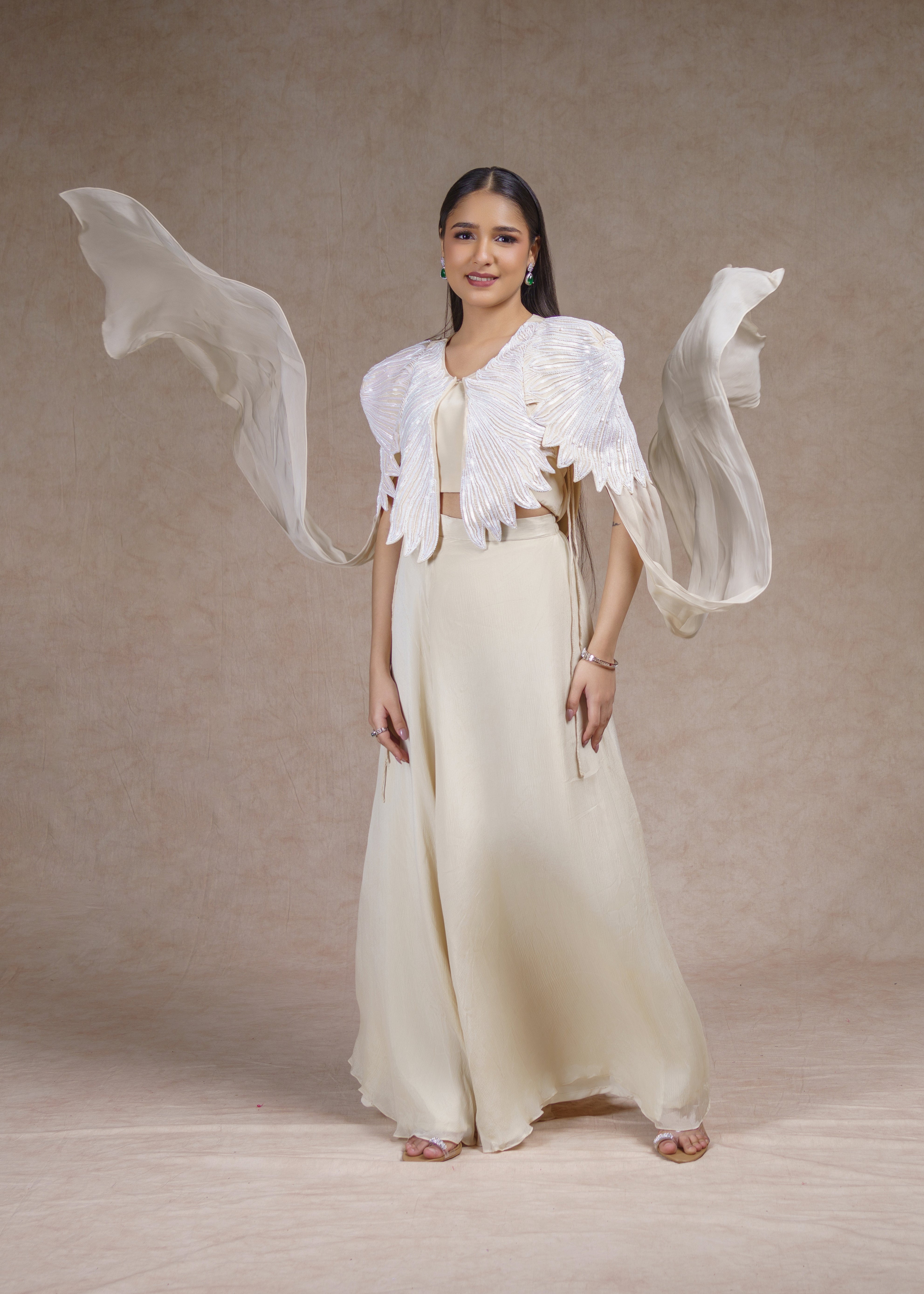 Ivory Drape skirt set with sleeveless jacket