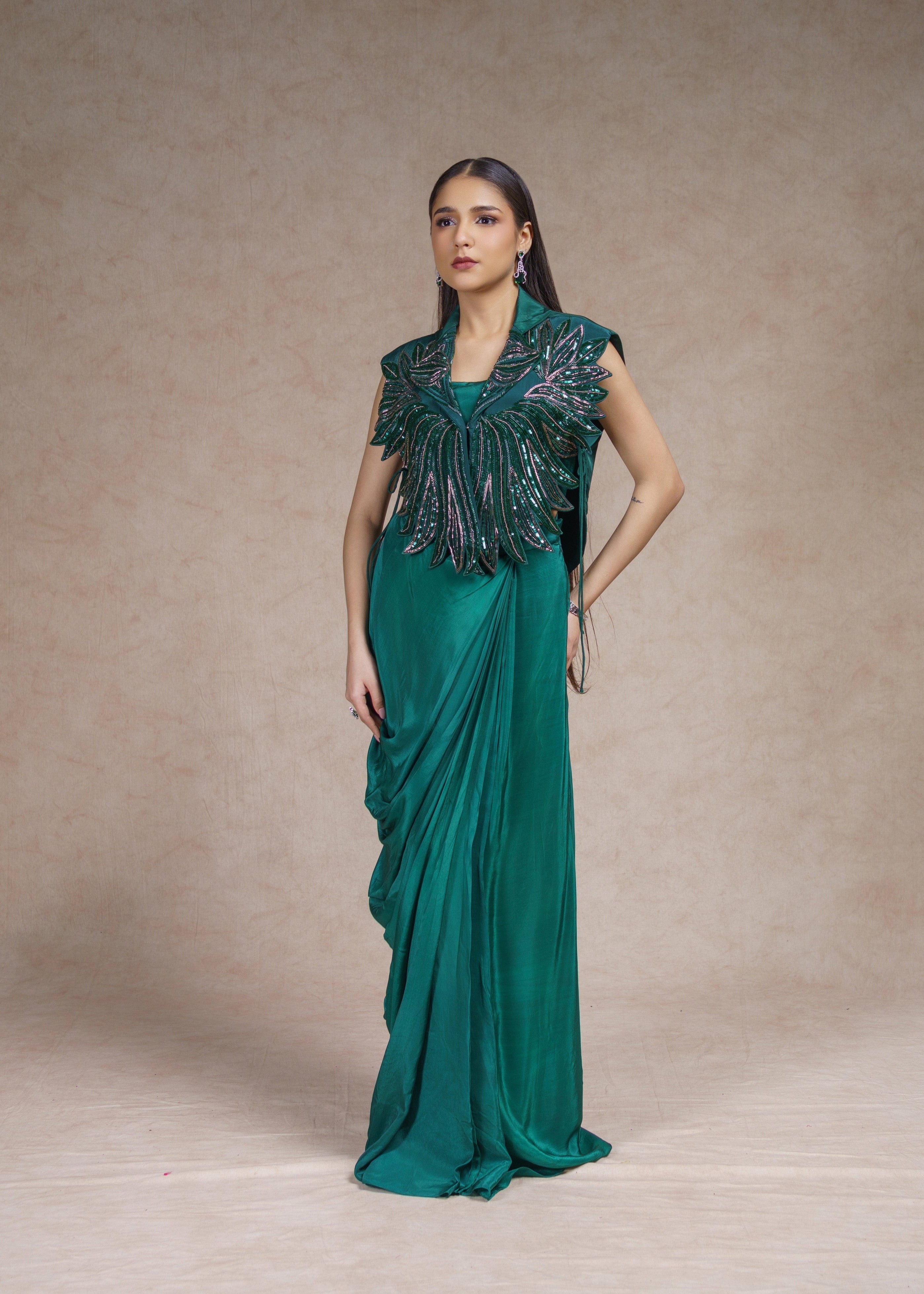 Green drape skirt set with sleeveless jacket