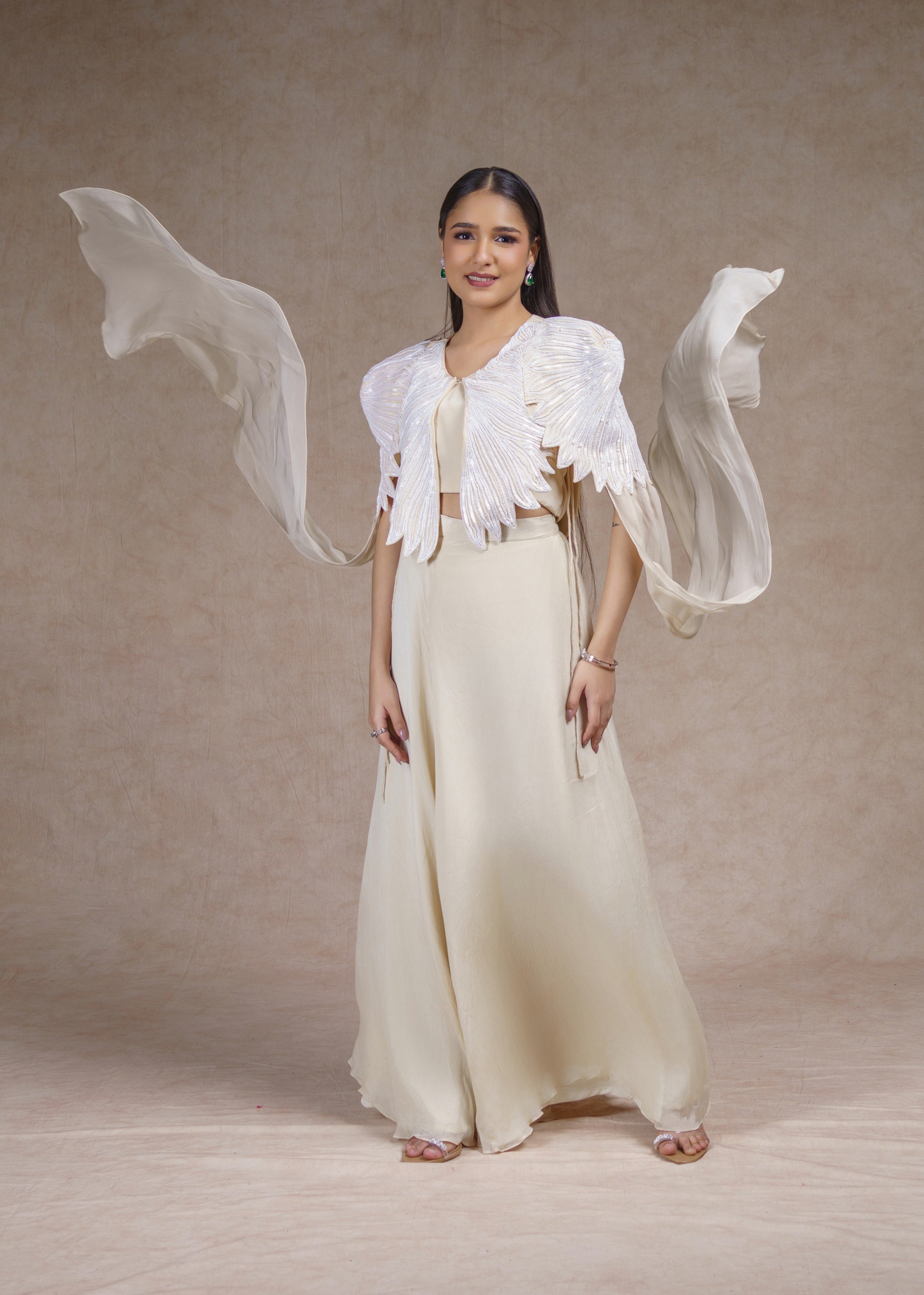 Ivory Drape skirt set with sleeveless jacket